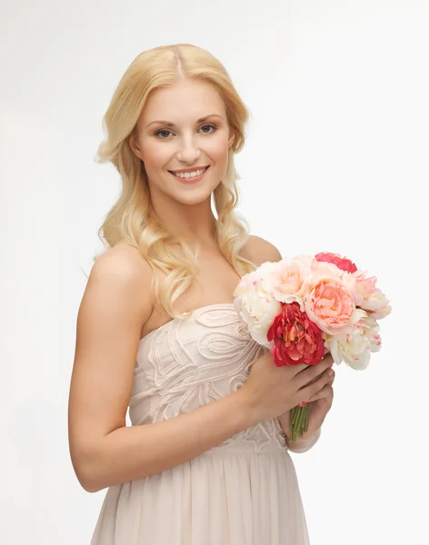 Woman with bouquet of flowers — Stock Photo, Image