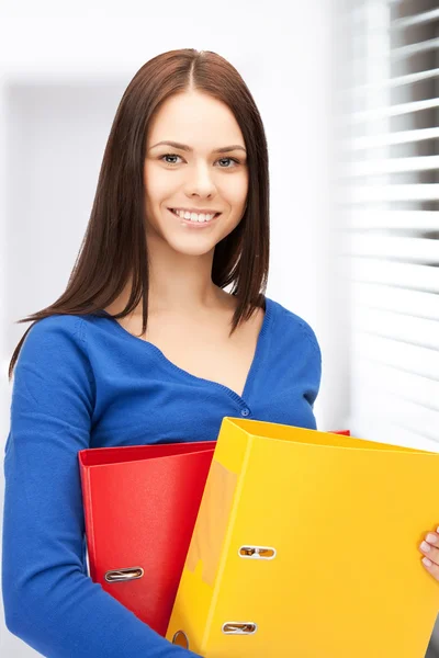 Mujer con carpetas — Foto de Stock