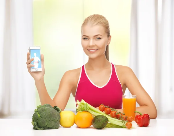 Mulher com frutas, legumes e tablet pc — Fotografia de Stock