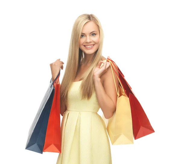 Mujer emocionada con bolsas de compras —  Fotos de Stock