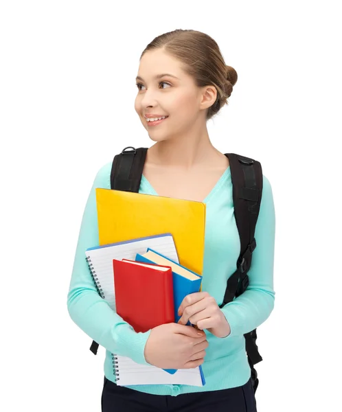 Student met boeken en Schooltasje — Stockfoto