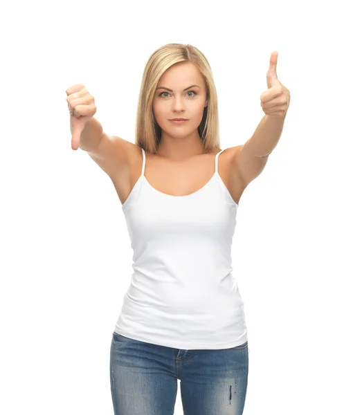 Woman with thumbs up and down — Stock Photo, Image