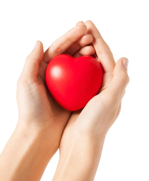 Vrouw handen met hart — Stockfoto