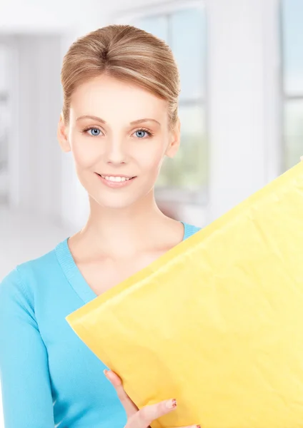 Businesswoman with parcel — Stock Photo, Image