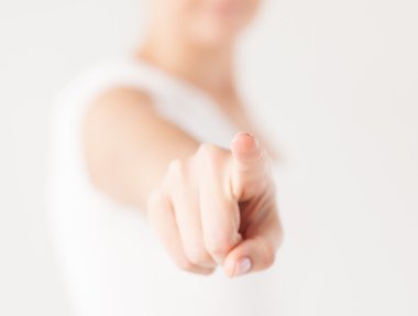 Woman pointing her finger at you clipart