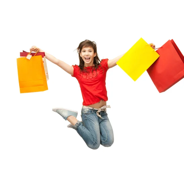 Fille excitée avec des sacs à provisions — Photo