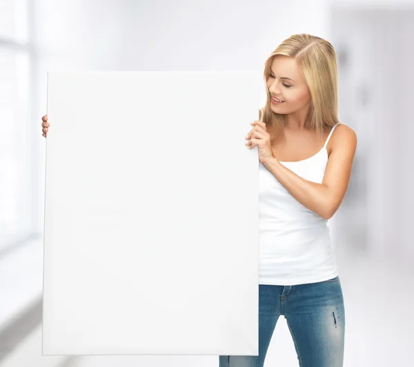 Woman with white blank board — Stock Photo, Image