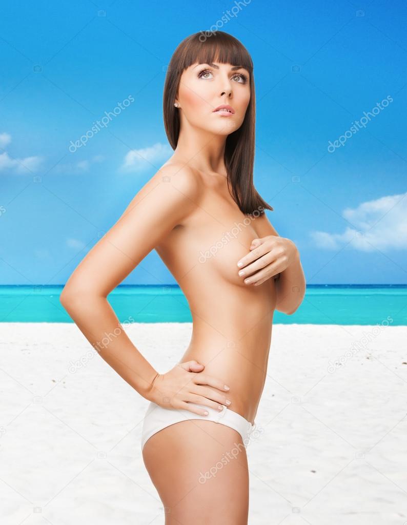 Topless Am Strand Bilder