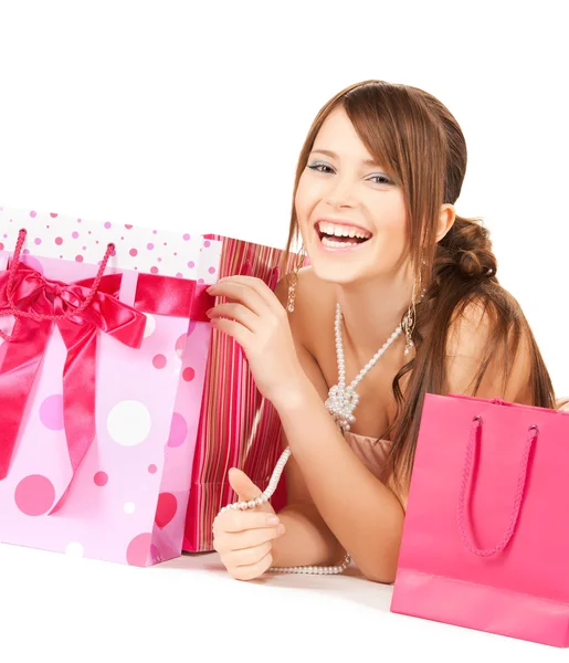 Chica con bolsas de regalo de colores —  Fotos de Stock