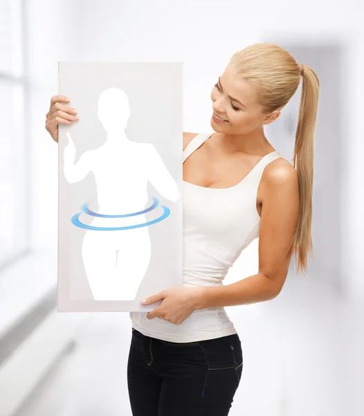 Woman holding picture of dieting woman — Stock Photo, Image