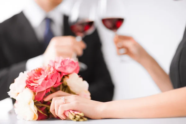Engaged couple with wine glasses — Stock Photo, Image