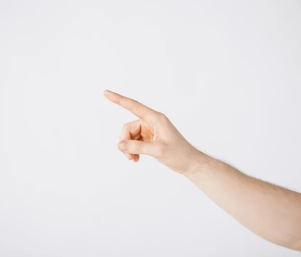 Man hand pointing at something — Stock Photo, Image