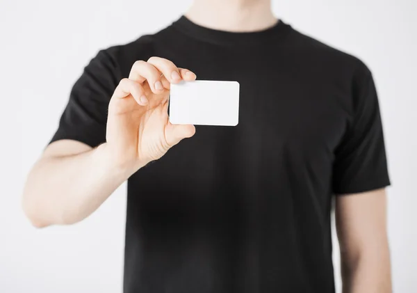 Homem mão com papel em branco — Fotografia de Stock