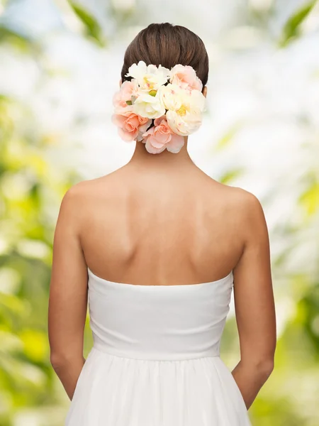 Woman with flowers in her head — Stock Photo, Image