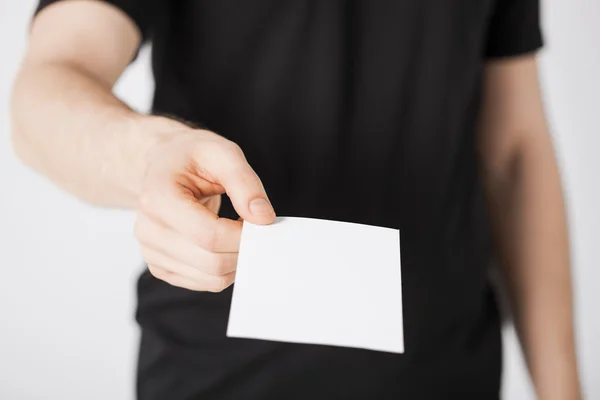 Man hand with blank paper — Stock Photo, Image