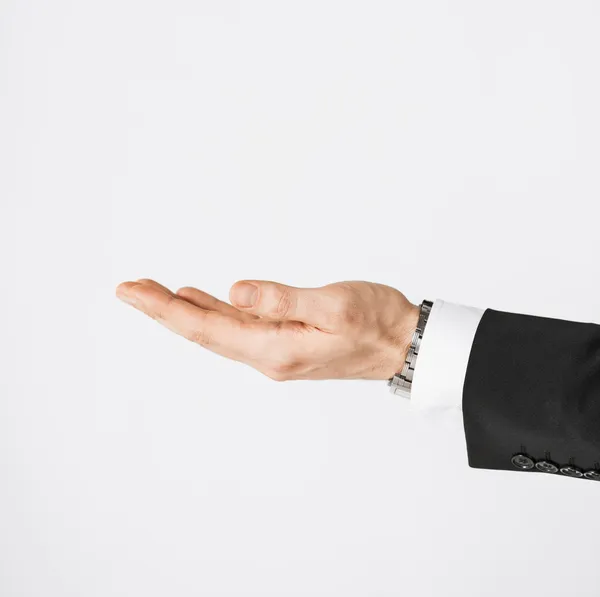 Mans hand showing something — Stock Photo, Image