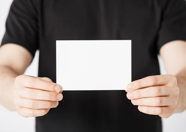 Man hand with blank paper — Stock Photo, Image