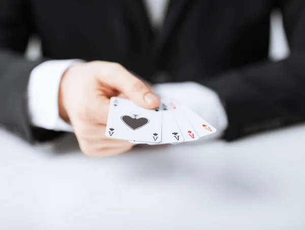 Man hand showing four aces — Stock Photo, Image