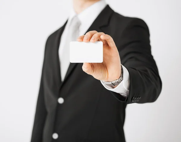 Mano de hombre con papel en blanco — Foto de Stock