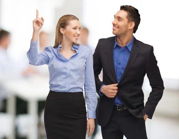 Man and woman pointing finger — Stock Photo, Image