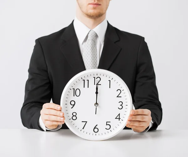 Man with wall clock — Stock Photo, Image