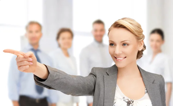 Businesswoman pointing her finger Royalty Free Stock Photos