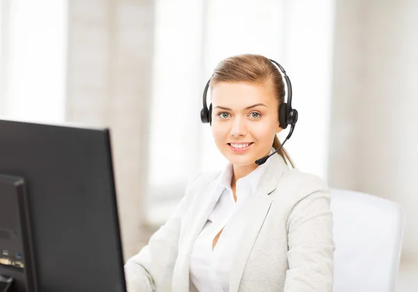 Friendly female helpline operator — Stock Photo, Image