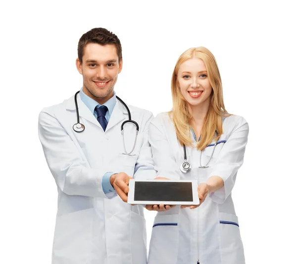 Young doctors showing tablet pc — Stock Photo, Image