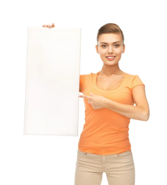 Mulher apontando para placa branca em branco — Fotografia de Stock