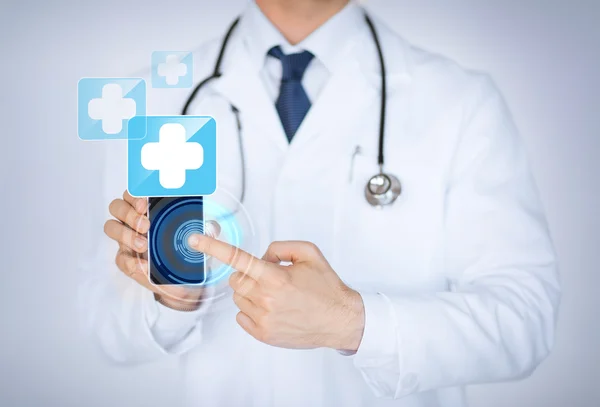 Doctor holding smartphone with medical app — Stock Photo, Image