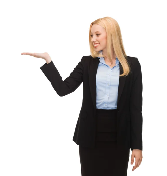 Man showing something imaginary on her hand — Stock Photo, Image