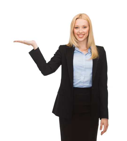 Man showing something imaginary on her hand — Stock Photo, Image