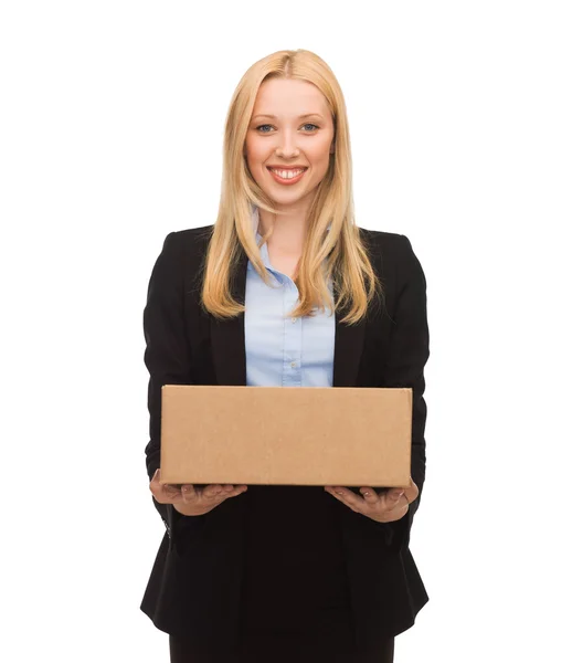 Businesswoman delivering cardboard box — Stock Photo, Image