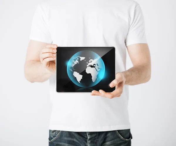 Man hands holding tablet pc with sign of globe — Stock Photo, Image