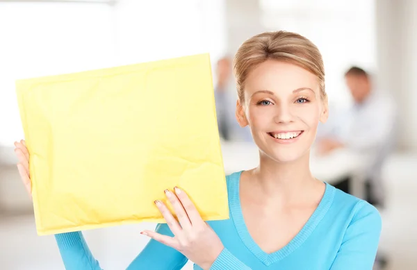 Businesswoman with parcel — Stock Photo, Image