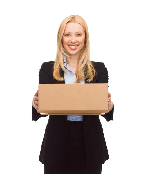 Businesswoman delivering cardboard box — Stock Photo, Image