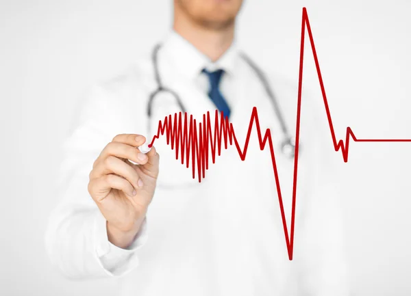 Doctor drawing electrocardiogram on virtual screen — Stock Photo, Image