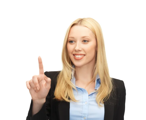 Businesswoman working with something imaginary — Stock Photo, Image