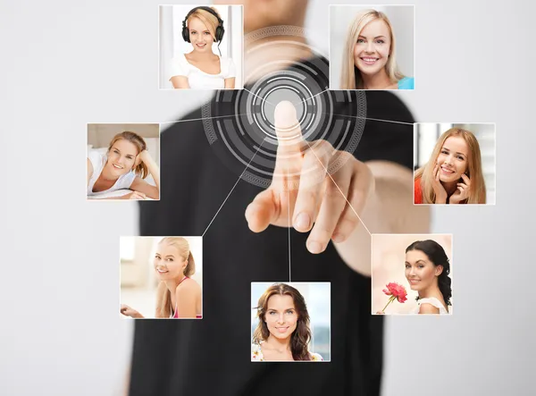 Man with virtual screen and contact icons — Stock Photo, Image