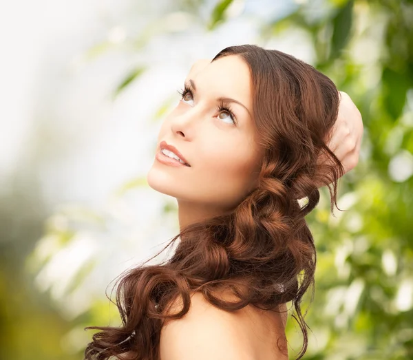 Beautiful woman on nature — Stock Photo, Image