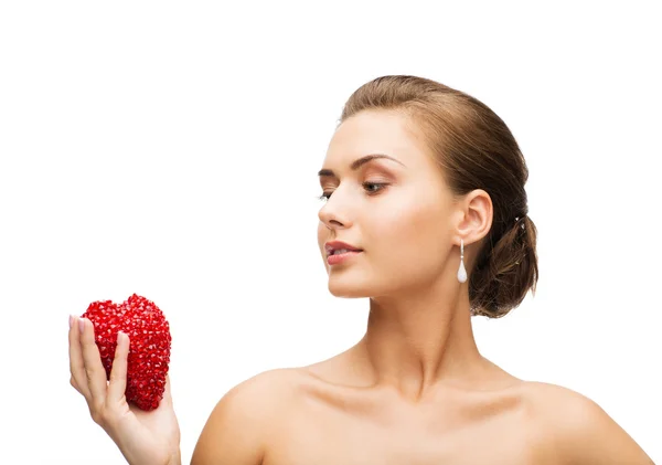 Woman wearing shiny diamond earrings — Stock Photo, Image