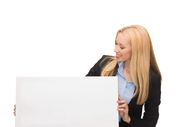 Businesswoman with white blank board — Stock Photo, Image
