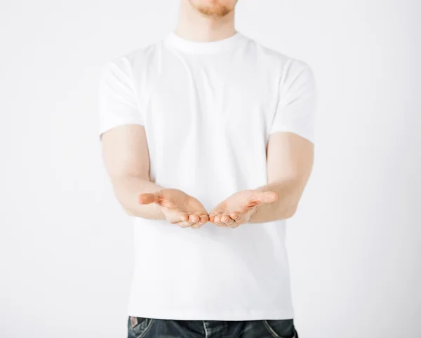 Mans hands showing something — Stock Photo, Image