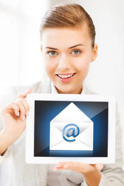 Businesswoman holding tablet pc with email sign — Stock Photo, Image