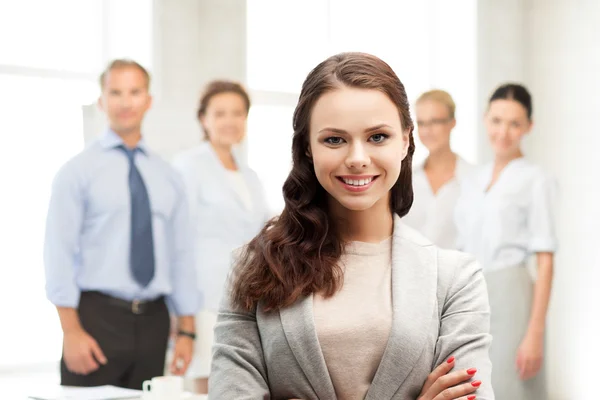 Attractive young businesswoman in office — Stock Photo, Image