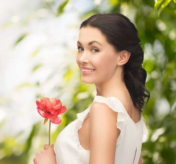 Young woman with flower — Stock Photo, Image