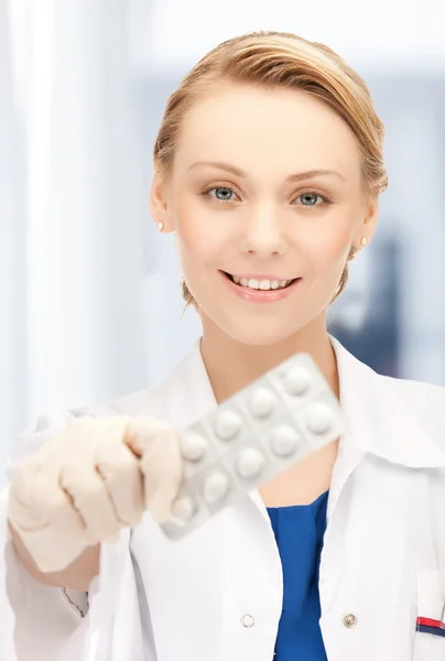 Doctor with blister pack of pills — Stock Photo, Image