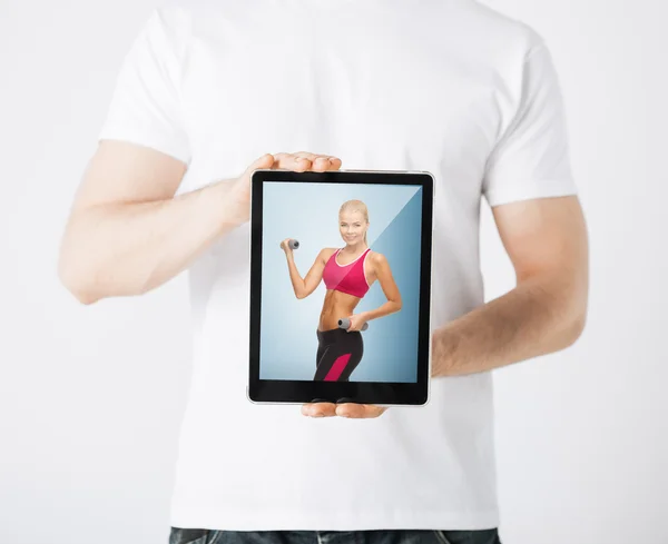 Człowiek z komputera typu tablet i sportowy kobieta — Zdjęcie stockowe