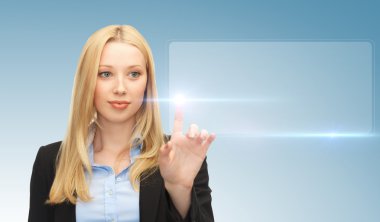 Businesswoman touching virtual screen clipart