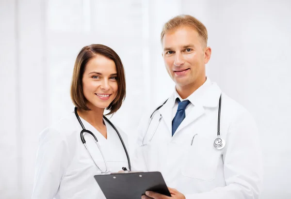 Two doctors with stethoscopes — Stock Photo, Image